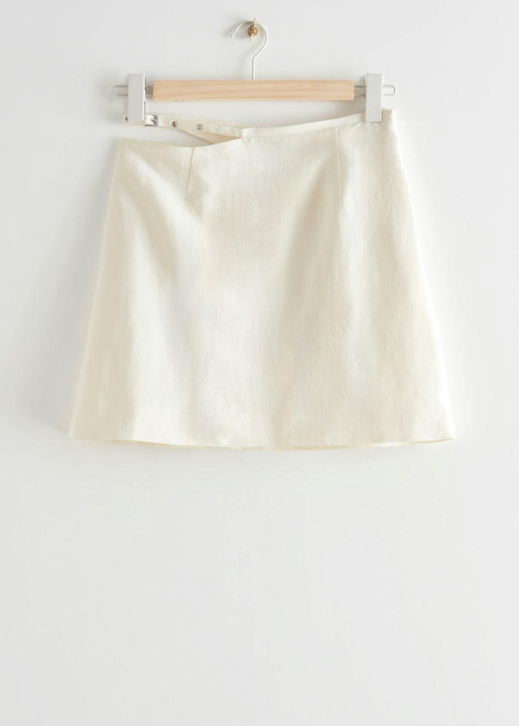 Cute looking amateur wears white skirt and white panties